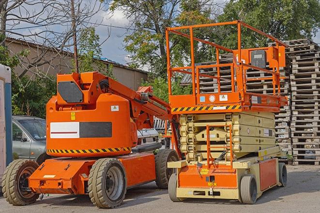 forklift operator moving heavy loads in a warehouse setting in Tukwila WA